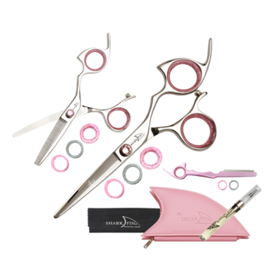 silver shear and texturizer with pink ring guards and pink knob with pink razor and pink case, cloth and oil pen