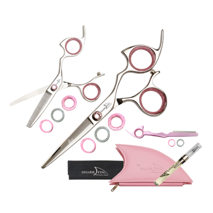silver shear and texturizer with pink ring guards and pink knob with pink razor and pink case, cloth and oil pen