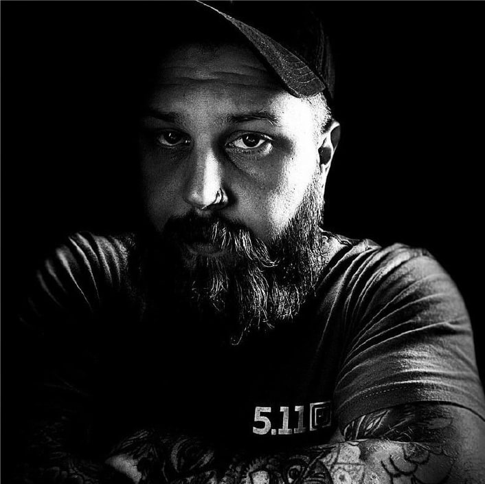 black and white picture of guy with beard