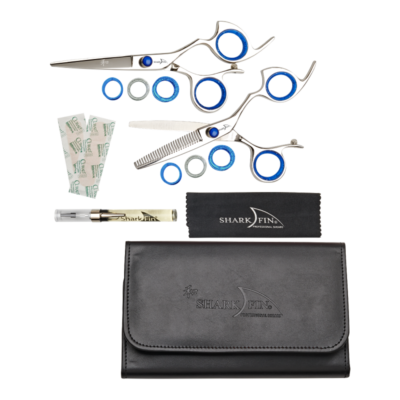 large pouch with silver shear and texturizer with blue knob and guards, oil pen and cloth