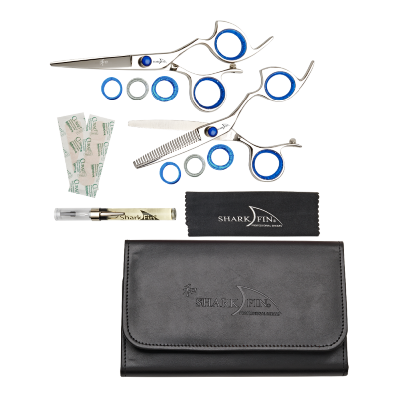 large pouch with silver shear and texturizer with blue knob and guards, oil pen and cloth