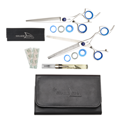 pouch with shear and texturizer, two combs, oil pen, cloth and bandaids